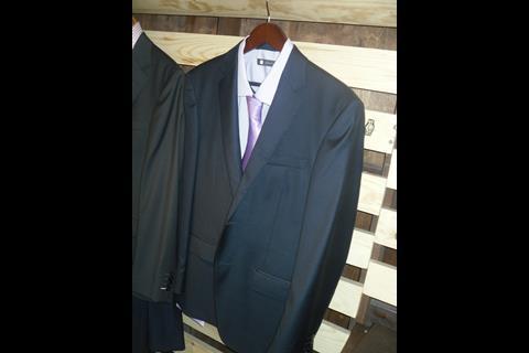 Arden Reed is using a 3D scanner, housed in its mobile shop, to get more accurate suit measurements